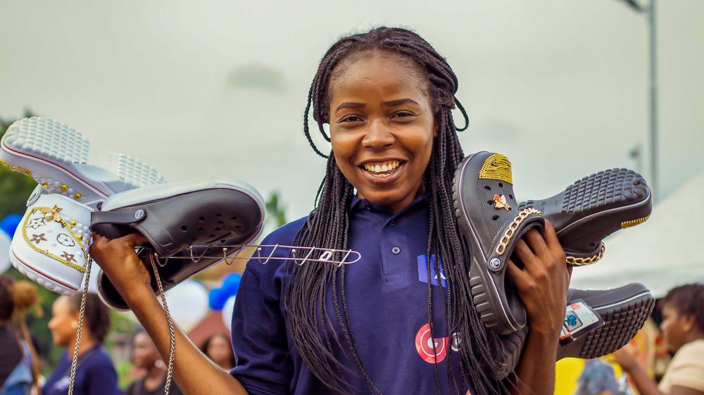 A business woman displaying her wares at Santa Fair Afrique, an annual trade fair that brings together women entrepreneurs to showcase a range of products and services to customers and visitors, in Enugu, Nigeria on April 21, 2025. Photo courtesy: Santa Fair Afrique